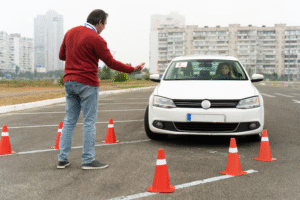 Instructor guiding adult driver during defensive driving courses Melbourne
